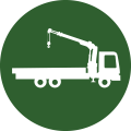 Circular green icon with a white graphic overlaid depicting a timber delivery truck with a crane extending from it